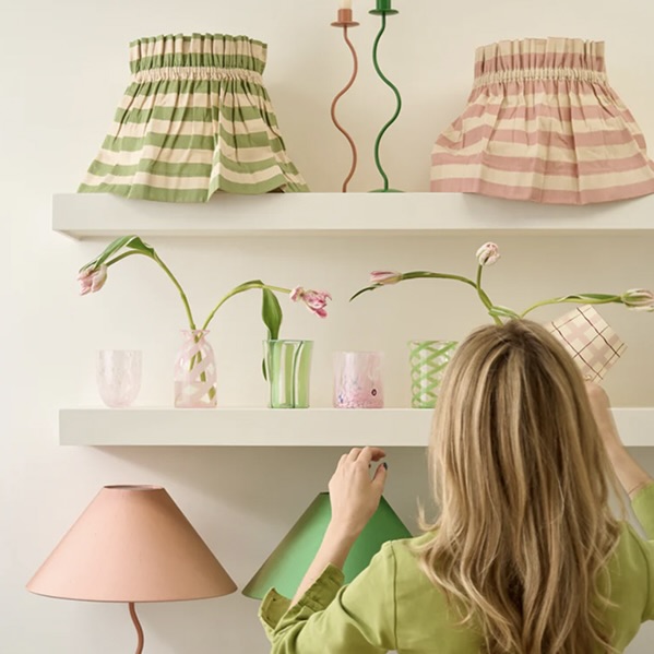 Shelf décor items such as modern lights and glassware